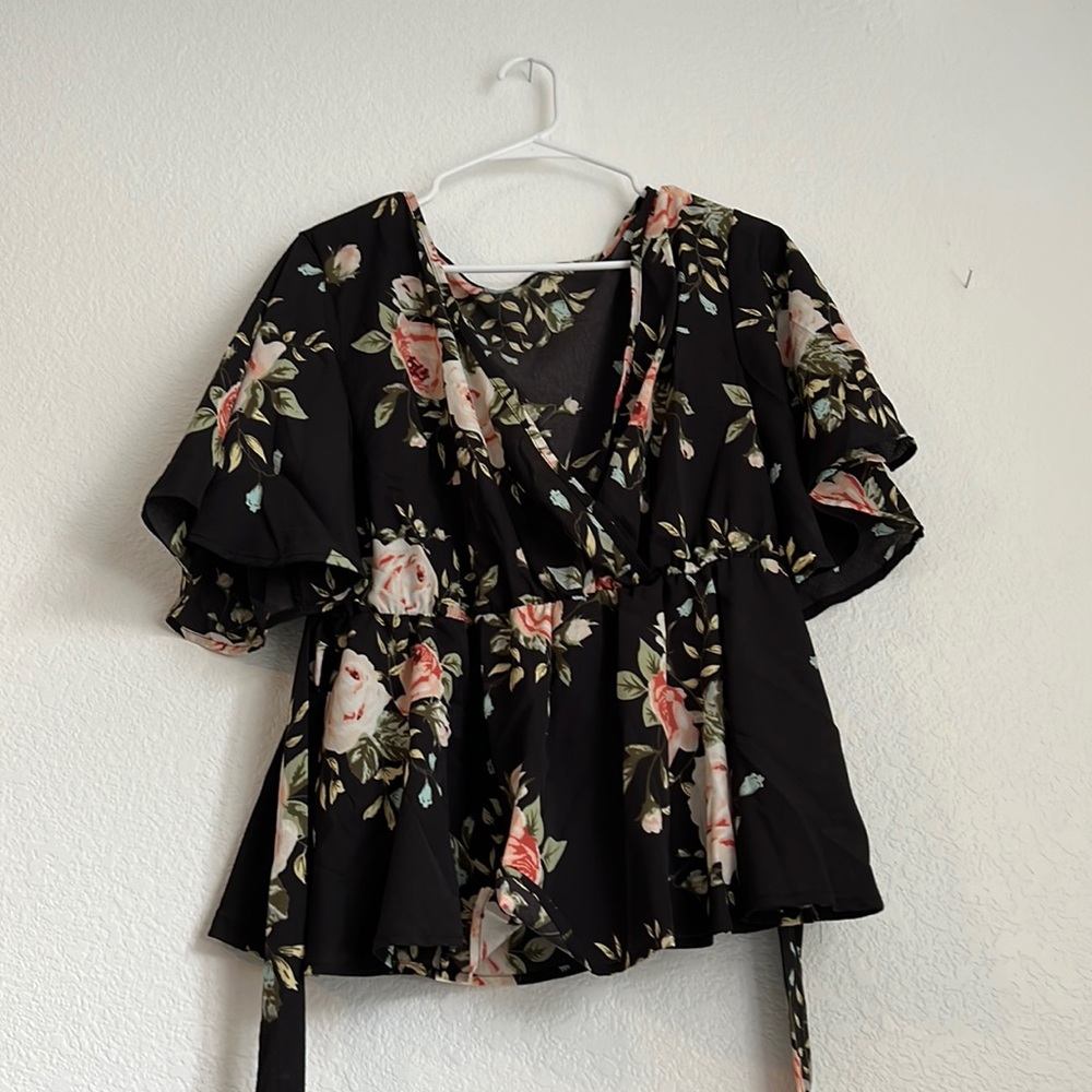 Black blouse with floral print and back tie v neck